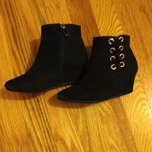 Little girls black wedge boots.
